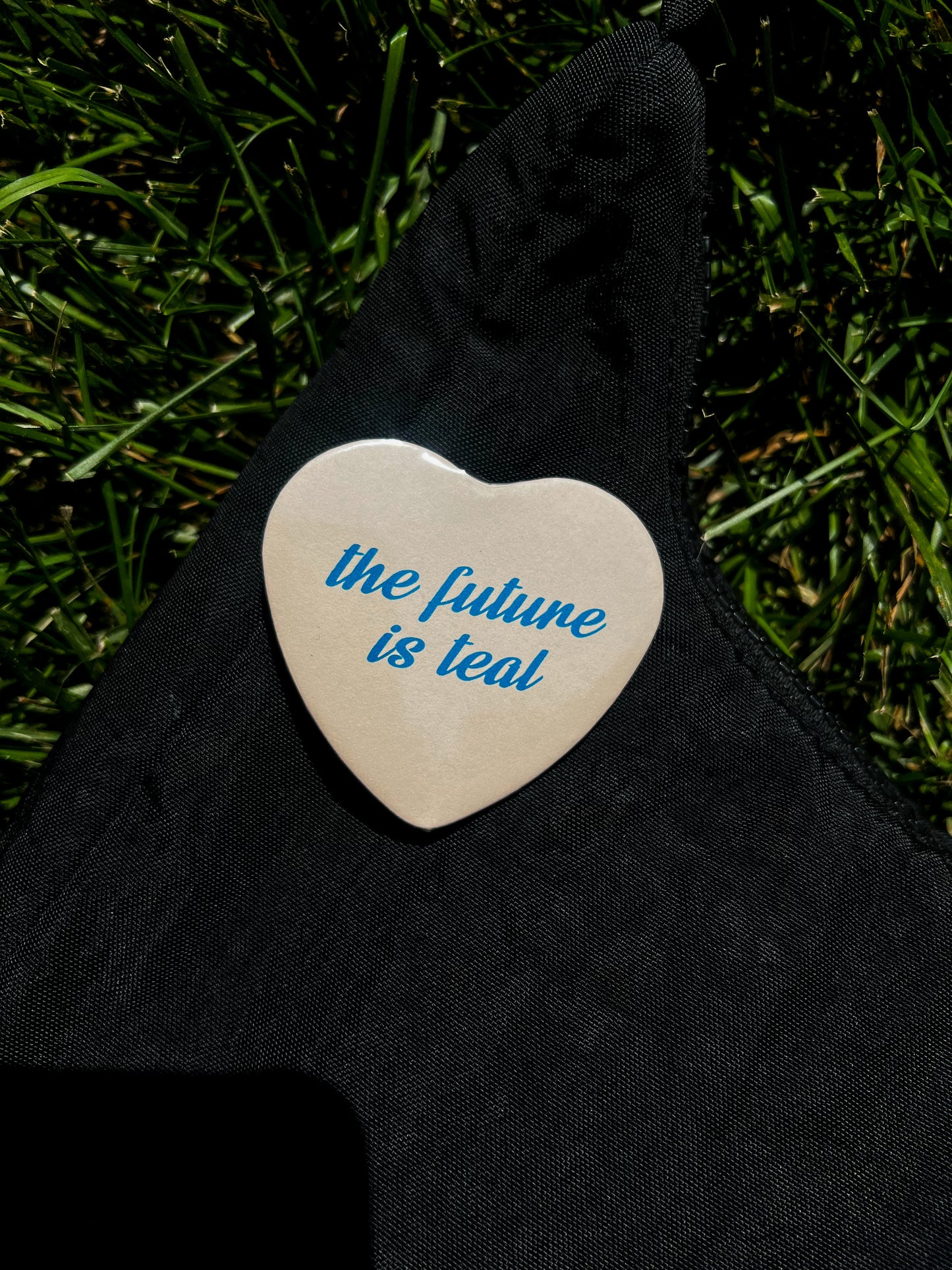 the future is teal pin